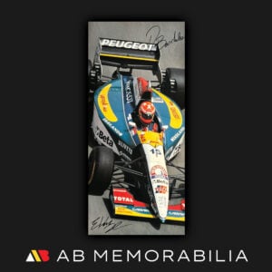 Official Jordan Grand Prix 1995 Formula One poster featuring the Jordan 195, dual hand signed by Rubens Barrichello and Eddie Irvine, authentic 1990s F1 memorabilia collectible celebrating the 1995 FIA Formula One World Championship season.