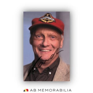 Niki Lauda signed Autograph photograph portrait with Paramlat cap, Lauda Air period.