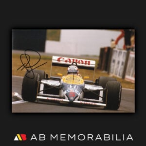 Nigel Mansell signed autographed memorabilia. Mansell pictured driving Williams FW11. 1992 F1 World Champion