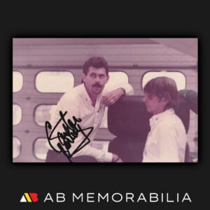 Gordon Murray signed original Brabham-era colour photograph, featuring a bold black autograph across the lower-left area.